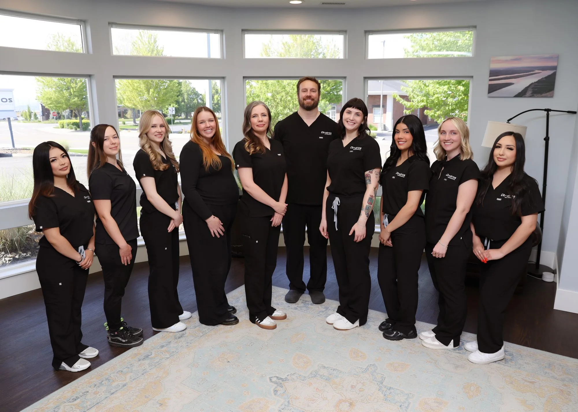 The full Andros Orthodontics team in the waiting room