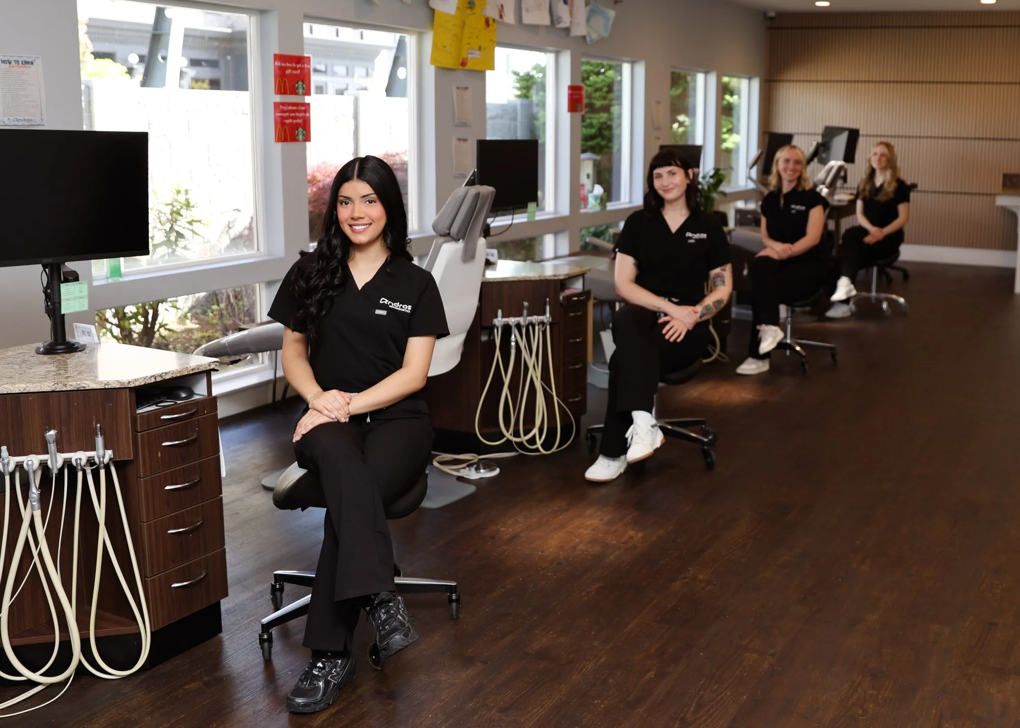 The clinical team at Andros Orthodontics in a treatment bay in Pasco, Washington